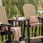 2-tone poly bar height settee on lake front deck.