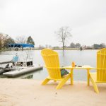 Amish crafted poly outdoor furniture - yellow settee on lake shore