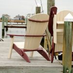 Amish crafted poly folding Adirondack chairs on dock