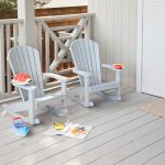 2 gray poly fanback rockers on a deck