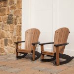 Amish crafted poly woodgrain rockers on hardscape patio