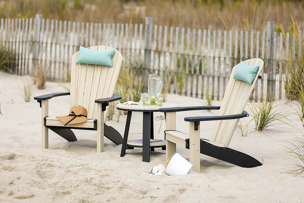 2 tone Adirondack chairs and accent table on grassy beach