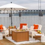 Poly deep seating patio furniture and loaded ice box ready for entertaining on riverside dock