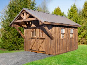 Manor with covered bridge style shed