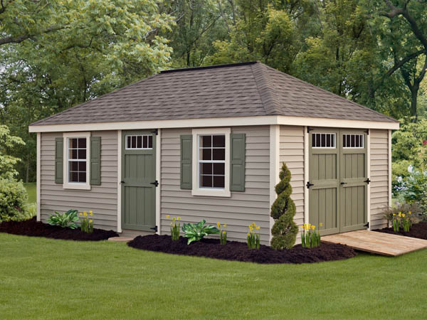 Deluxe Villa Style affordable vinyl storage shed pictured on a lawn
