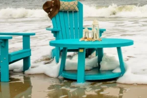 poly chairs and coffee table in the surf at the beach