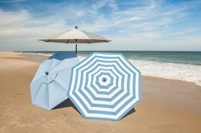 finch sunbrella umbrellas on beach