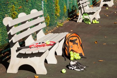 park benches in tennis court