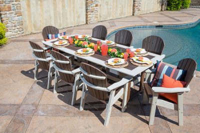great bay dining table and chairs by swimming pool